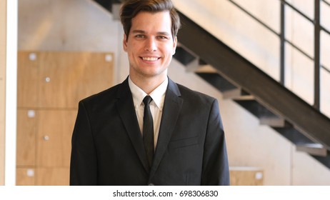 Smiling Young Man in Suit