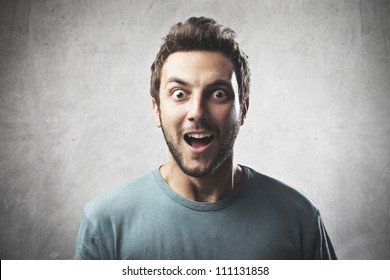 Smiling Young Man With Surprised Expression