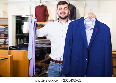 Smiling Young Owner Guy Displaying Jacket Stock Photo 2025432701 ...