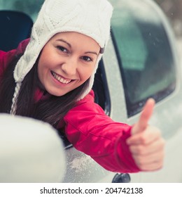 Smiling Young Pretty Woman In The Car - Safe Winter Driving Concept