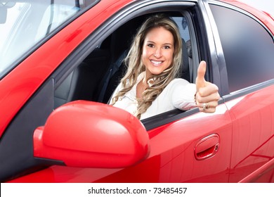 Smiling Young Pretty Woman  In The Car