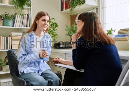 Similar – Image, Stock Photo Young woman talking on the phone