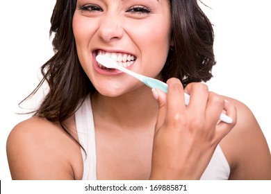 Smiling Young Woman With Healthy Teeth Holding A Tooth Brush