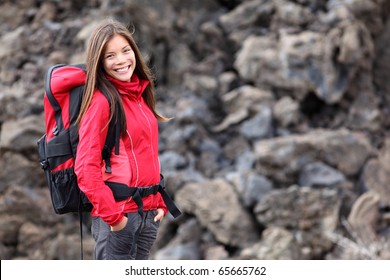 Smiling Young Woman Hiker Hiking Outdoors. Portrait Of Mixed Race Asian / Caucasian Model. Photo From Teide, Tenerife.