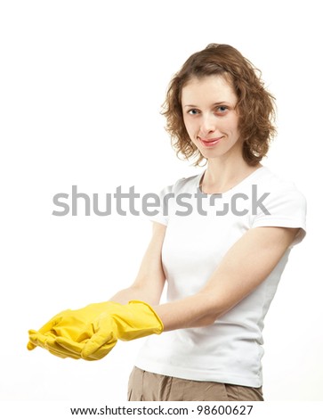 Smiling young woman reaching out hands in rubber gloves, copy space; white background