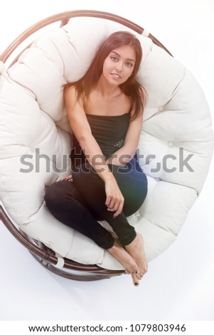 Similar – Woman in an armchair