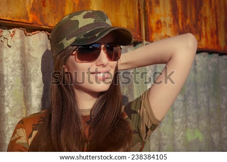 Smiling Young Woman Soldier in Camouflage Outfit - Portrait of a happy beautiful female army soldier 