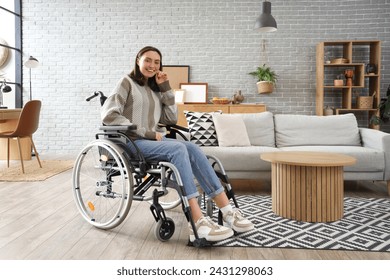 Smiling young woman in wheelchair at home - Powered by Shutterstock