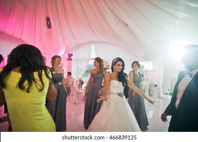 The Smilling Bridesmaids And Bride  Dancing On The Dancefloor