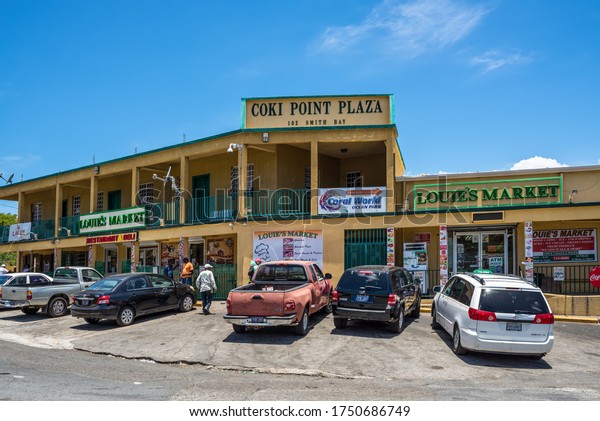 Smith Bay, St.\
Thomas, U.S. Virgin Islands (USVI) - April 30, 2019: Shopping\
center Coki Point Plaza in Smith Bay settlement at St Thomas, U.S.\
Virgin Islands,\
Caribbean.