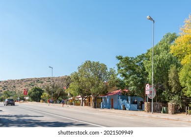 SMITHFIELD, SOUTH AFRICA - APRIL 23, 2021: A Street Scene, With Businesses, People And A Vehicle, In Smithfield In The Free State Province