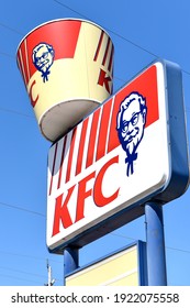 Smiths Falls, ON, Canada - July 8, 2018: Sign with iconic Colonel Sanders on bucket at the KFC store on Main Street
