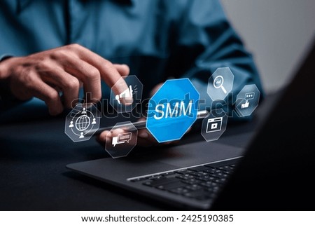 SMM, Social Media Marketing concept. Businessman use laptop with SMM icon for Customizing profile page to give your customers the best visiting experience.