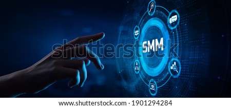SMM Social media marketing Internet online advertising. Hand pressing button on screen.