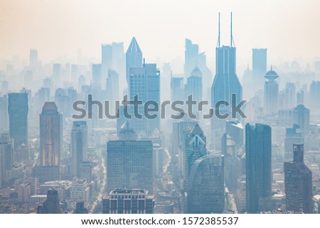 Smog in the city. Panorama view. Hi-rise buildings (skyscrapers) in Shanghai, China
