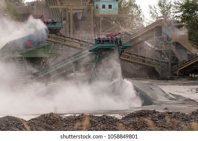 Smog and dirty dust air pollution industrial background on outdoor rock crushing and digging plant factory