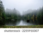 Smoke from BC wildfires hangs heavy above the water at Colliery Dam Park in Nanaimo, Vancouver Island, BC