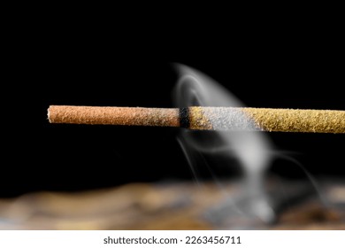 a smoke from the burning of incense - Shutterstock ID 2263456711