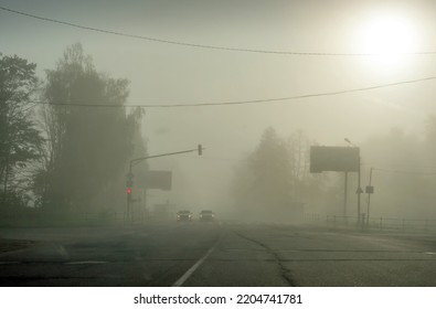 Smoke From Burning Peat Bogs Enveloped The Road In The City