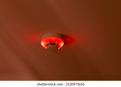 Smoke Detector Fire Alarm Setup Mount At Condominium Or Apartment Room Ceiling Activated Red Light