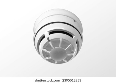 Smoke detector on white ceiling. Safety at home - Shutterstock ID 2395012853