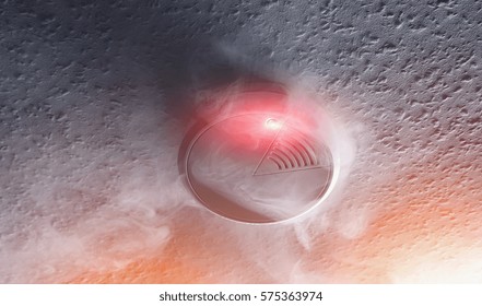 Smoke Detector With White Smoke And Red Warning Light