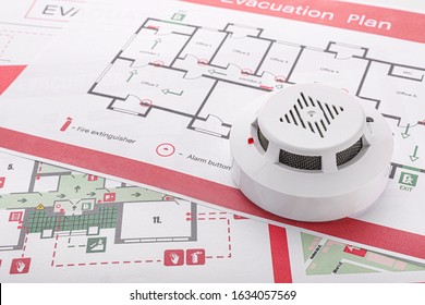Smoke detectors on evacuation plans - Powered by Shutterstock
