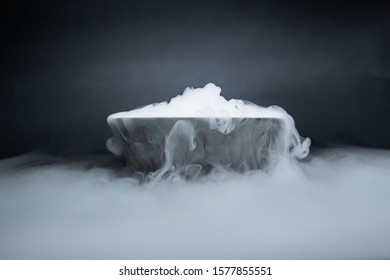 Smoke From Dry Ice In A Bowl, Black Background