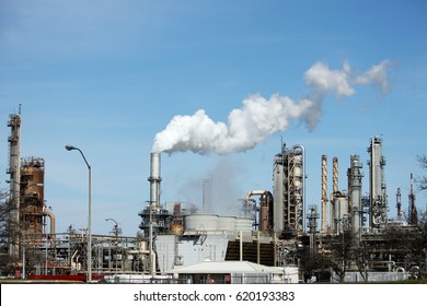 Smoke Exiting From a Tall Stack  in A Manufacturing Plant               
