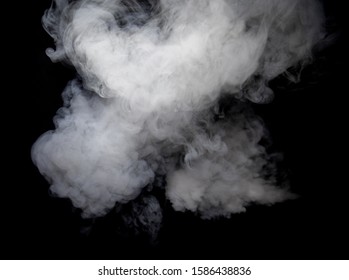 smoke explore over dark background inside room  - Shutterstock ID 1586438836