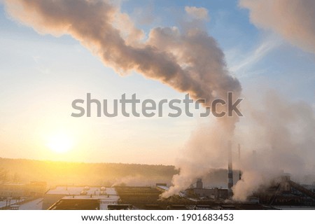 Foto Bild Schornsteine Rauch Wolken und Meer