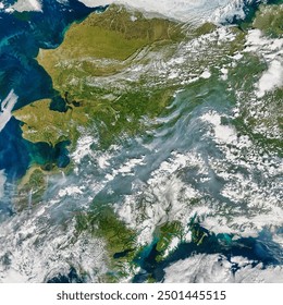 Smoke in Fairbanks and Interior Alaska. Smoke from fires burning across Alaska posed air quality concerns. Elements of this image furnished by NASA. - Powered by Shutterstock