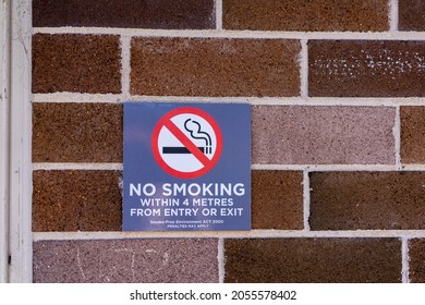 Smoke Free Sign On Wall Of Building Warning Sign