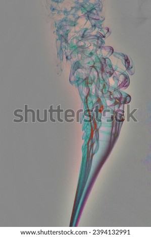 Smoke from an incense cone, distorted colors.
