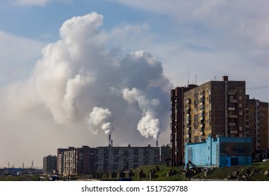 The Smoke Of The Norilsk Combine. The Sky In The Smoke From The Chimneys Of Norilsk Nickel Plant.