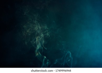smoke on blackbackground.Movement of white smoke.black background. Smoke from cigarettes. 