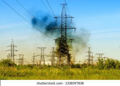 Smoke Over The High-voltage Power Line. A Fire In The City's Electricity Supply Network. Problems With Power Supply Of The Population With Energy