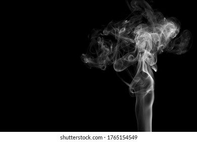 Smoke Plume From A Burning Incense Stick. Setup Was A Black Muslin Cloth As A Backdrop, Flashes