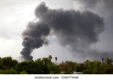 Smoke Rising From A Structure Fire