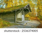 Smoke sauna surrounded by autumn colors. The Gallen-Kallela Museum. Helsinki, Finland