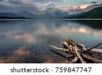 The Smoke from the Sprague Fire can be seen Across the Still Waters of Lake McDonald in Glacier National Park at Sunset