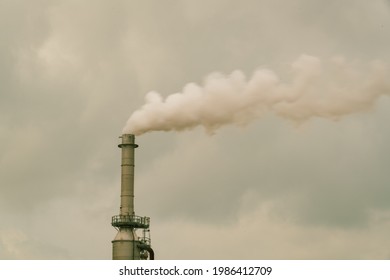 Smoke Stack Carbon Pollution Cloud And Skies Of A Polluted Atmosphere Climate Change And Dangerous Toxic Chemicals Above Oil Refinery In South Texas