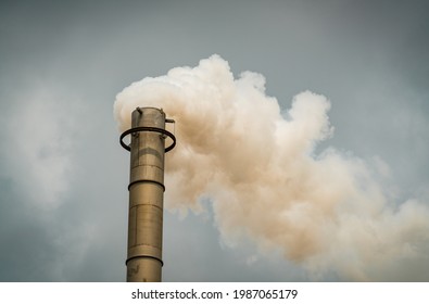 Smoke Stack Carbon Pollution Cloud And Skies Of A Polluted Atmosphere Climate Change And Dangerous Toxic Chemicals Above Oil Refinery In South Texas