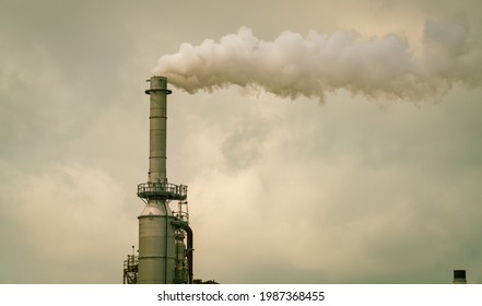 Smoke Stack Carbon Pollution Cloud And Skies Of A Polluted Atmosphere Climate Change And Dangerous Toxic Chemicals Above Oil Refinery In South Texas