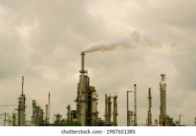 Smoke Stack Carbon Pollution Cloud And Skies Of A Polluted Atmosphere Climate Change And Dangerous Toxic Chemicals Above Oil Refinery In South Texas