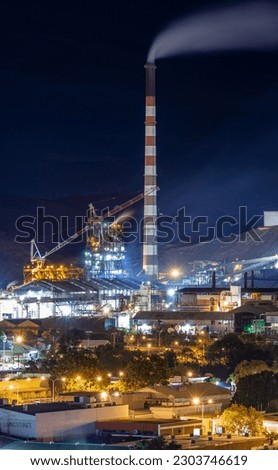 Smoke stacks at Mount Isa mines at night