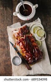 Smoked Bbq Baby Back Ribs On Rustic Background