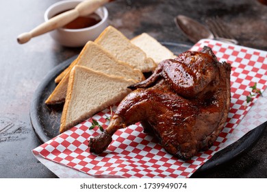 Smoked Bbq Half Chicken Served With Barbeque Sauce And Toast