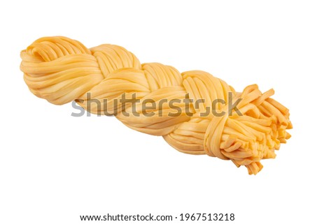 Smoked braided cheese piece isolated on white background