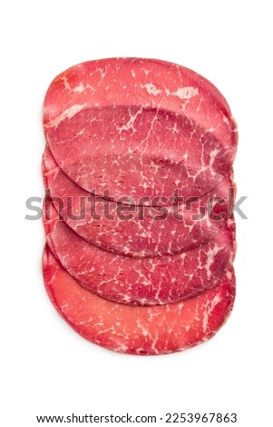 Smoked bresaola. Italian appetizer. Dried beef meat isolated on the white backgorund.